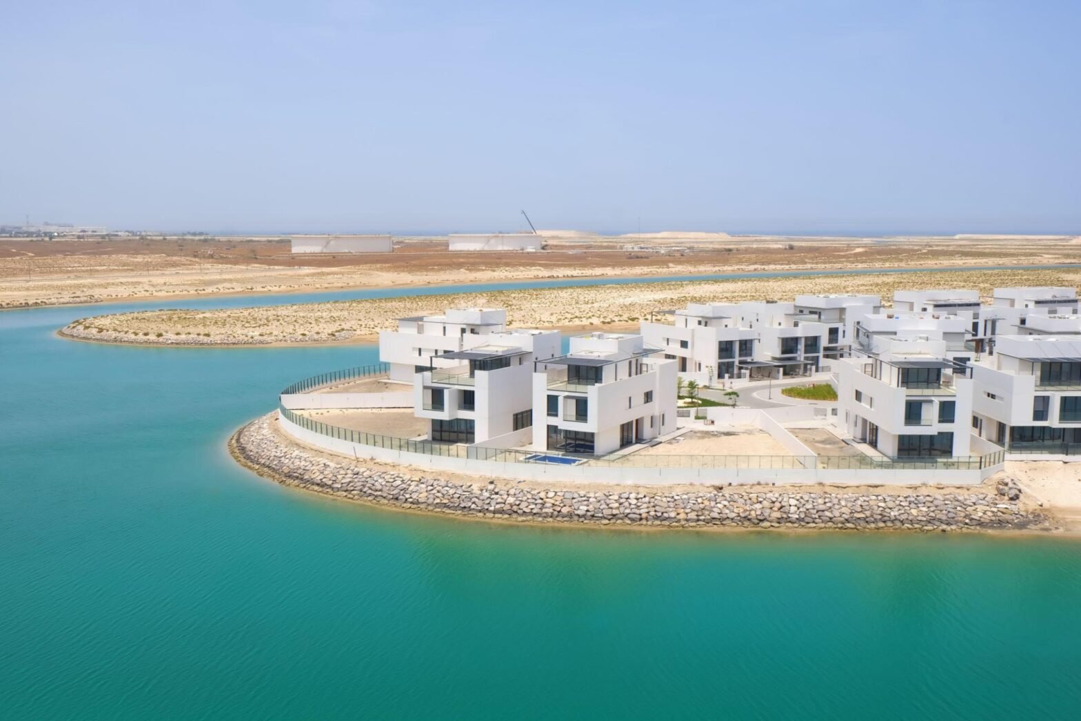 Shoreline Ras Al Khaimah waterfront residences with beach and views